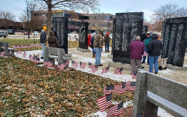 Flags decorate Veterans Day ceremony in downtown Mason City