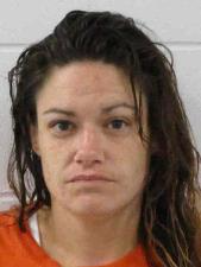 Mason City woman accused of assaulting two at Garner house, kicking a police officer
