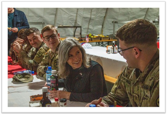 Ernst meets with member of 1133rd Transportation Company during trip to Poland