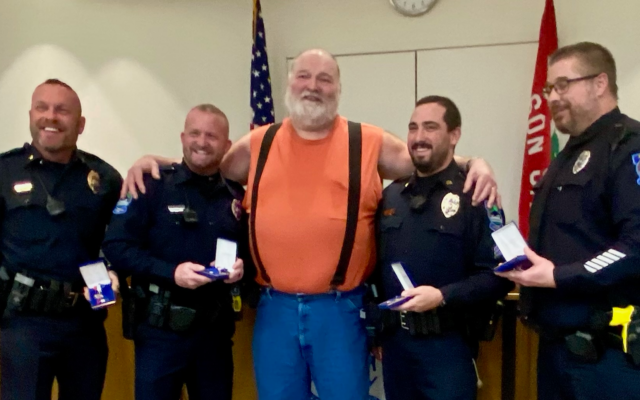 Four Mason City police officers given lifesaving awards for helping man trapped under tractor