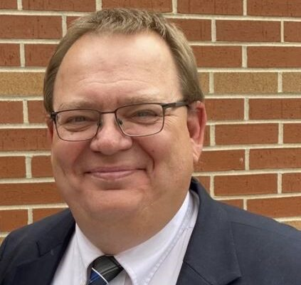 Body of principal returning to Perry